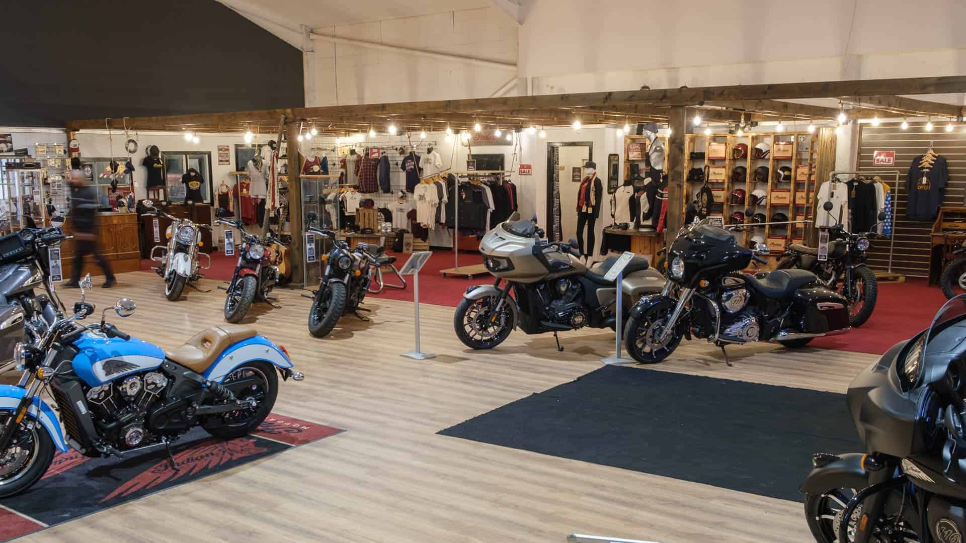 shop full of motorcycle clothing and motorcycles on display
