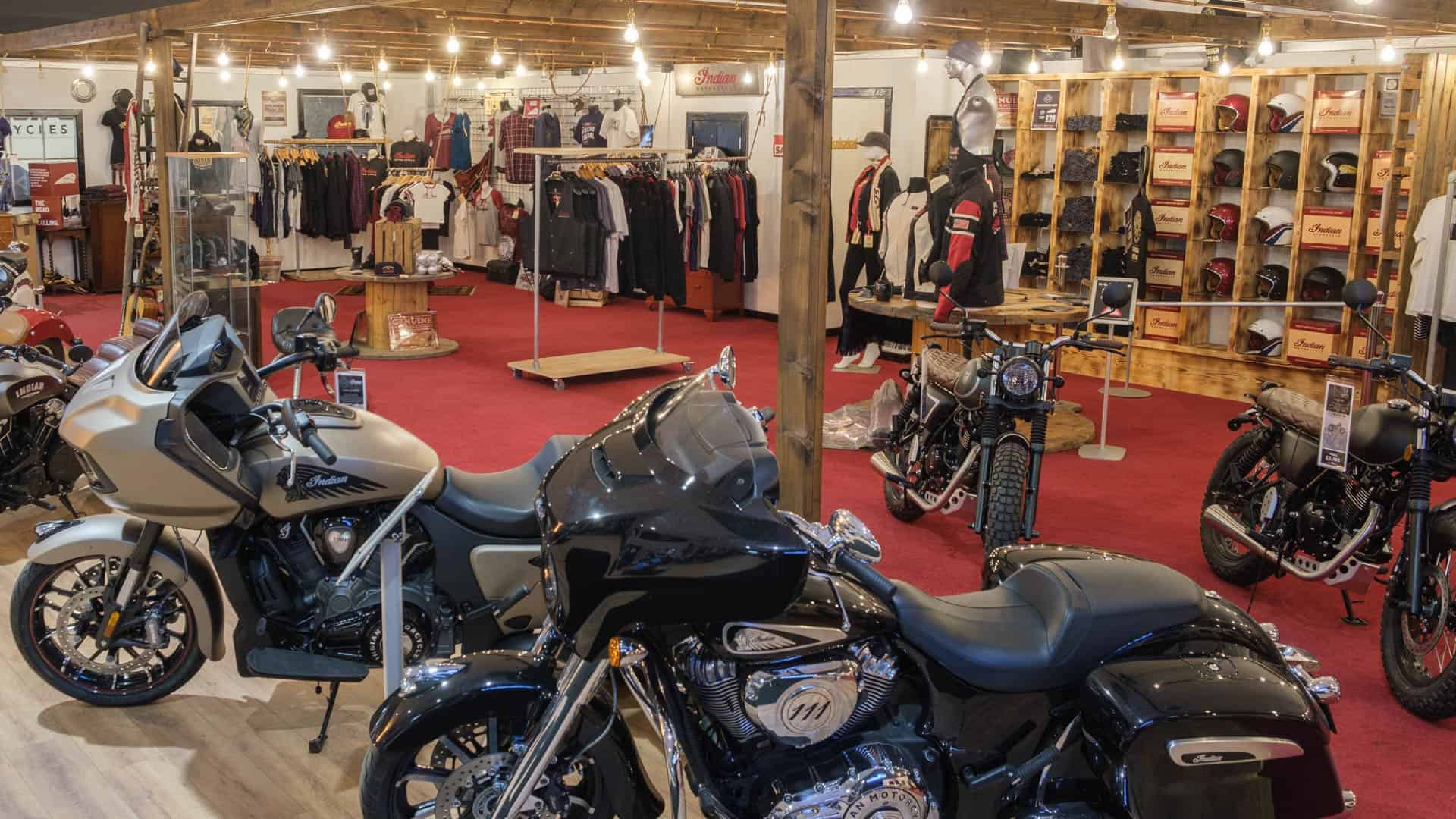 shop full of motorcycle clothing and motorcycles on display