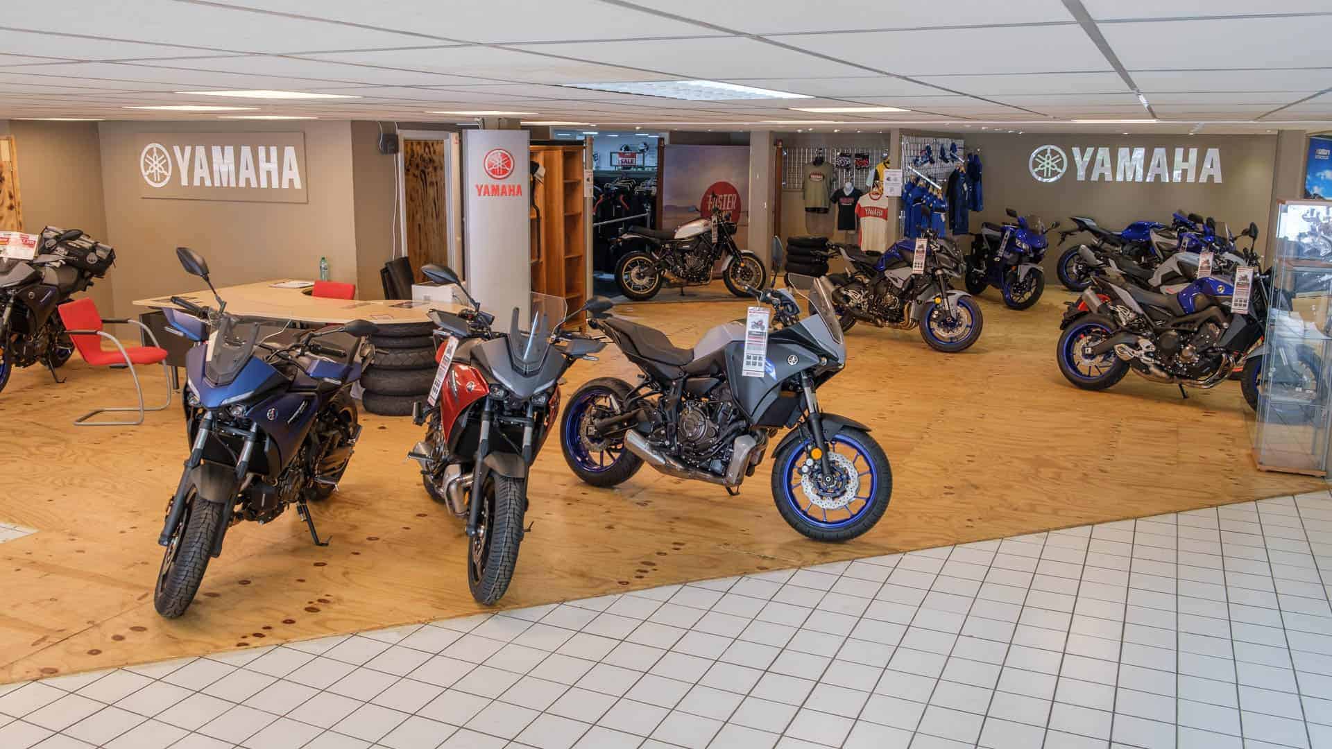 Yamaha motorcycles on display in shop