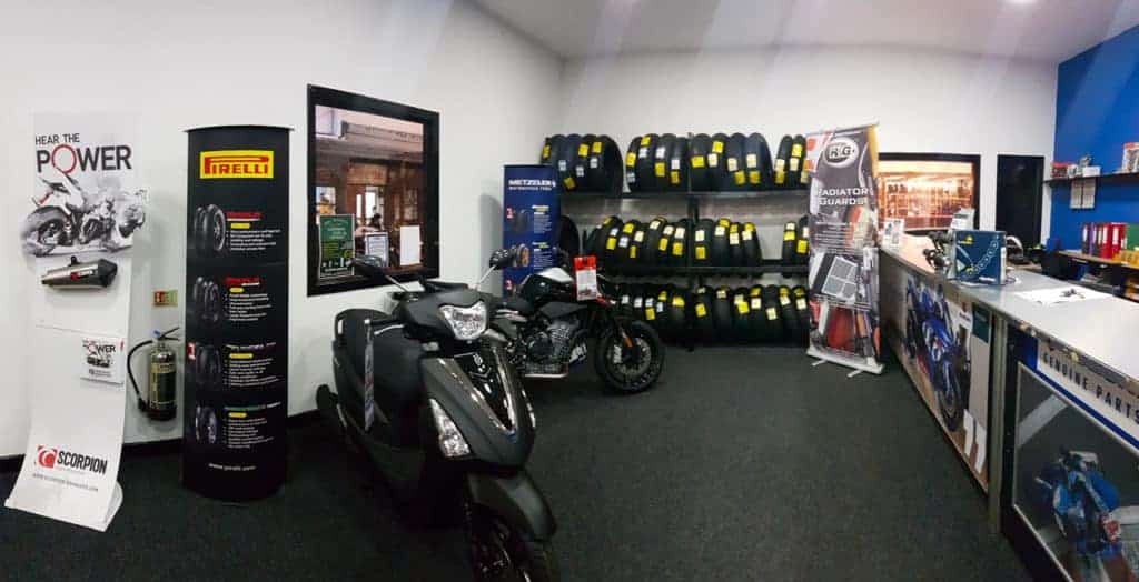 Shop containing motorcycles and tires